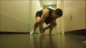 Handstandpushup.com Intermediate Handstand Push Up Guide Bent Arm Pose Knees Tucked End Position