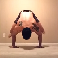 Handstandpushup.com Hanstand push-up shoulder exercises bent arm stand with straddled legs 1