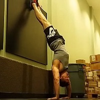Handstandpushup.com Bent Arm Press Up Handstand end position