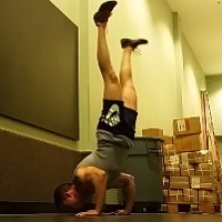 Handstandpushup.com Bent Arm Press Up Handstand middle 2 position