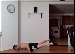 handstandpushup.com handstand push-up home workouts 90 degree handstand push-up to bent arm planche hold black shorts