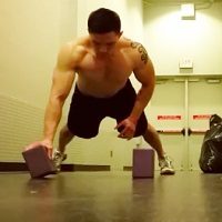 Handstand push-up CHEST EXERCISE tilted yoga block 1 arm 1 leg push-up