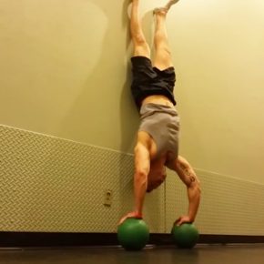 handstandpushupcom supplements for athletes kerry don handstand pushups on green medicine balls